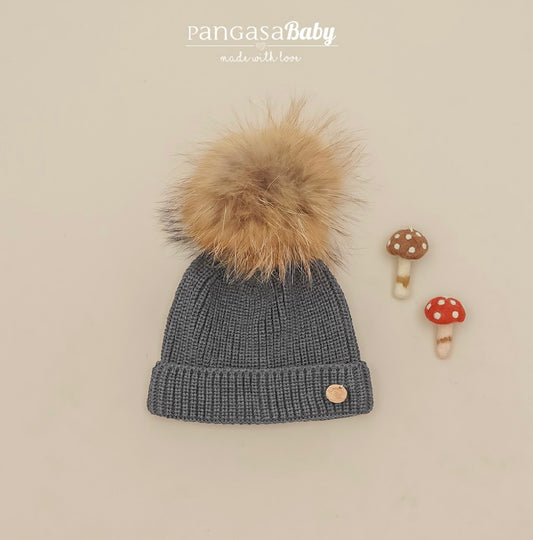 Cappello con pon pon